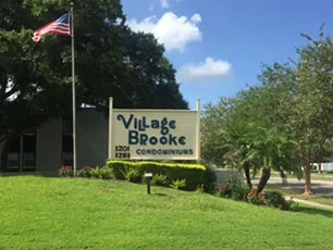 Grounds and mature trees maintained by Greenscapes at Village Brooke