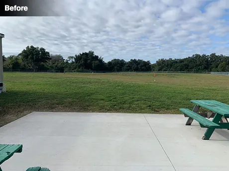The turf area beside the school football field before work began